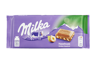 Шоколад Мілка подрібнений лісовий горіх Milka broken haselnuss 80g 25шт/ящ (Код: 00-00005222)