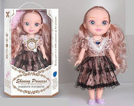 Музична лялька YL 005 A-3, 34 см, з аксесуарами в ошатному платті