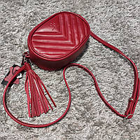 Женская кожаная сумка на пояс красного цвета Grande Pelle