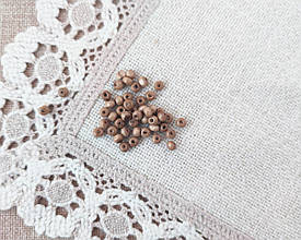 Дерев'яні намистини світло-коричневі 6 мм. 20 г