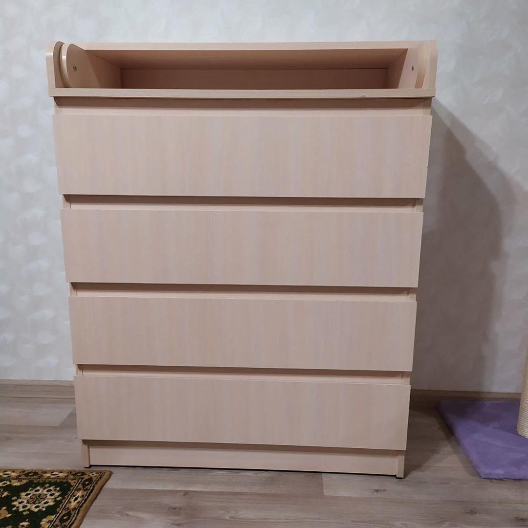 Дитячий комод сповивальний на телескопах колір дуб молочний