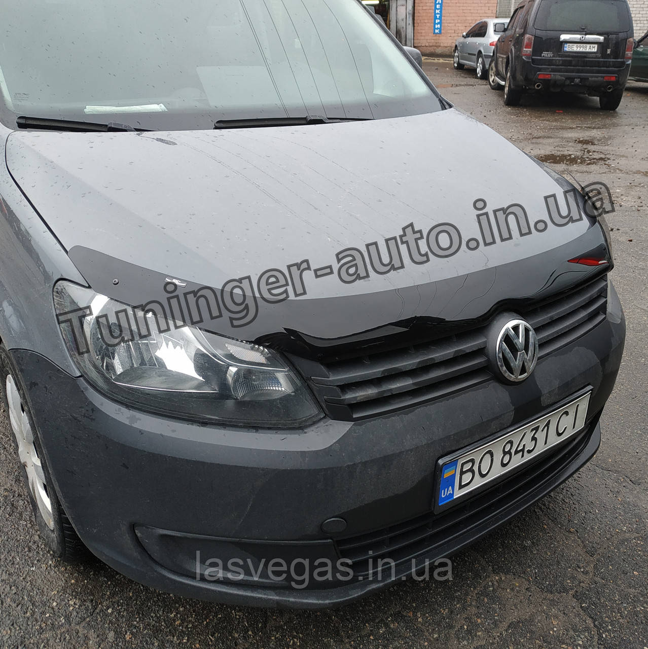 Дефлектор капота (мухобійка) Volkswagen Caddy/Touran 2010- 2015 (HIC)