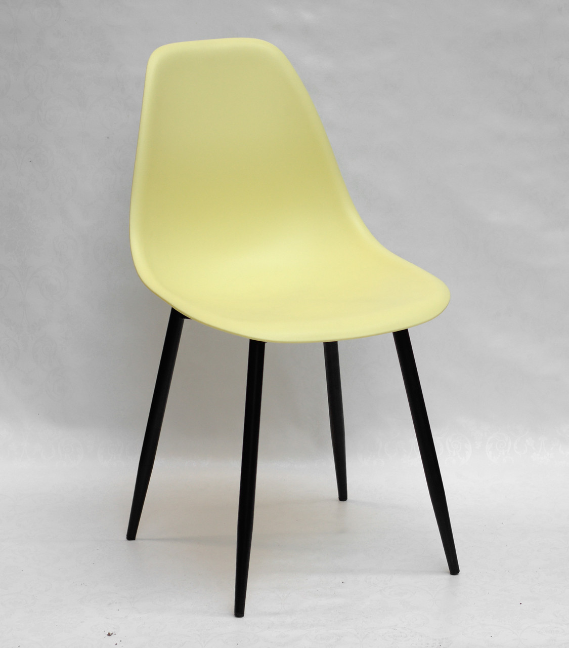 Стильний стілець суцільнолите сидіння на чорних металевих ніжках Nik ML жовтий