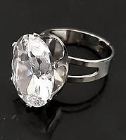 Кільце під срібло з білим фіанітом. Діаметр кільця: 2 см. Безрозмірне з 18 р.