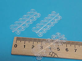 Кнопки для одягу пришивні пластикові 7мм. Прозорі (комплект 18 кнопок)