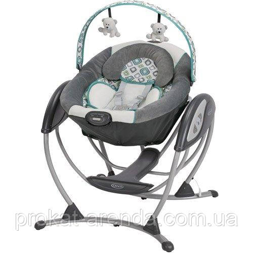 Безшумний заколисуючий центр Graco Glider