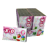 Жувальна гумка Х-Dent з освіжаючим м'ятно-фруктовим смаком, захист від карієсу, для дорслих та дітей.