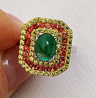 Великолепное кольцо с натуральным бразильским изумрудом 8х6 мм (кабошон) и сапфирами Сонгеа Размер 17.5