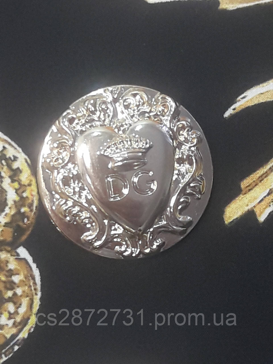 Пуговицы Dolce & Gabbana  круглой формы , металические диаметром 25 мм