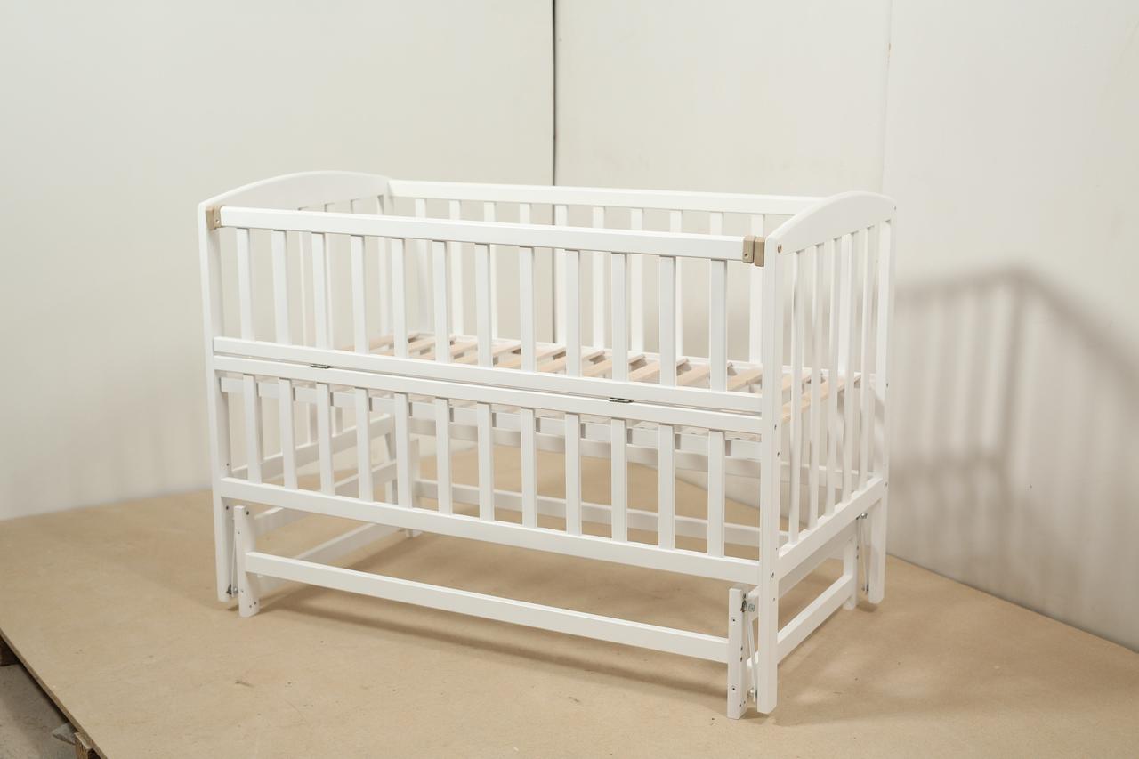 Детская кроватка Гойдалка VALERI с откидной боковиной на шарнирах бук белая