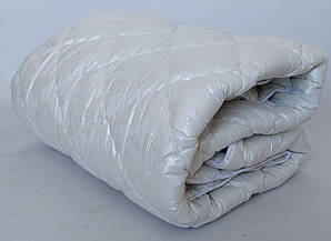 Тепла стьогана ковдра з наповнювачем із натуральної овечої вовни