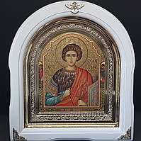 Икона Георгия Победоносца в белом арочном киоте с декор. уголочками, размер 26*29