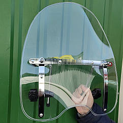 Лобове скло для мотоцикла з вирізом під фару з металевою П-подібною рамкою