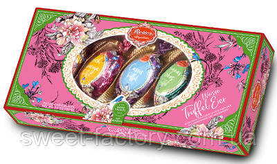 Шоколадні яйця Reber Spezialitaten Weisse Truffel Eier 100g, фото 1