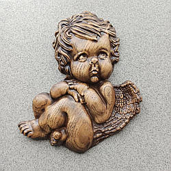 Барельєф "Янголок"