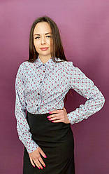 Блуза блакитна в огірки