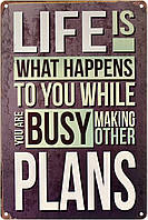 Металева табличка / постер "Життя - Це Те, Що Відбувається З Тобою, Поки Ти Будуєш Інші Плани" 20x30см (ms-002304)