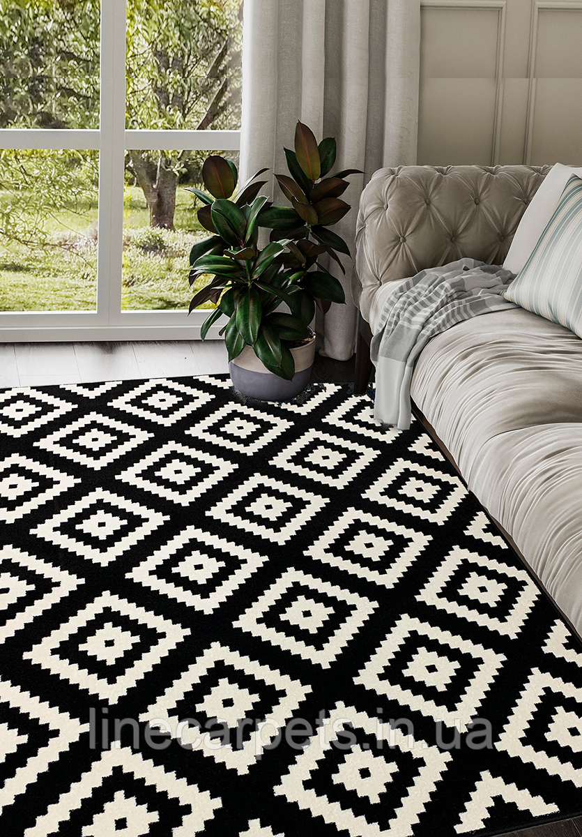 Черно белый ковер в интерьере - 85 фото