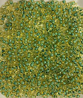 Бисер Ярна Корея размер 10/0 цвет 1.216 светлый топаз, внутренний цвет - зеленый прокрашенный 50г