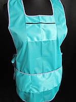 Гарний однотонний фартух із кишенями