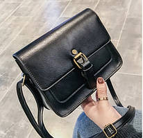 Дуже красива маленька жіноча сумочка чорного кольору