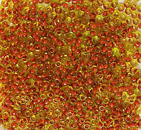 Бісер Ярна Корея розмір 10/0 колір18.207/10 прозорий салатовий, внутрішній колір - фуксія 50г