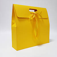 Пакет подарунковий жовтий 350х100х350 мм.