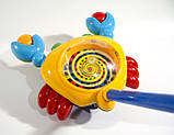 Каталка крабик жовтий з дзвіночком в кульку, фото 6