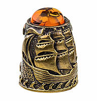 Наперсток для коллекции бронзовый с янтарем Фрегат с кабошоном