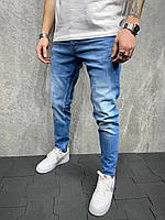 Світло-сині джинси чоловічі класичні з незначними потертостями Джинсы мужские синие базовые з потёртостями