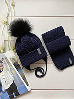 Зимовий теплий в'язаний набір шапочка на флісі та шарфик із натуральним бубоном ручної роботи.