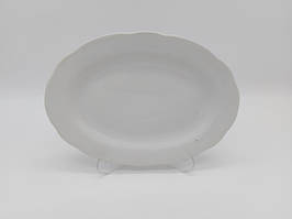 Блюдо овальне керамічне біле сервірувальне Тарілка для риби з хвилястим краєм Біла гладь 25,5*18,5 cm
