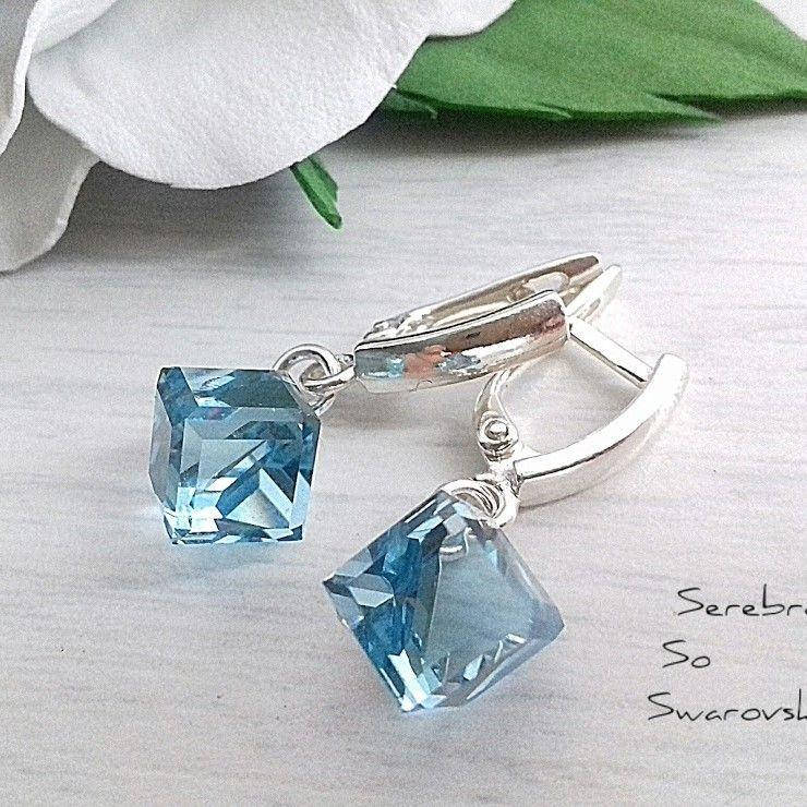 

Серьги висюльки из серебра с камнями Сваровски