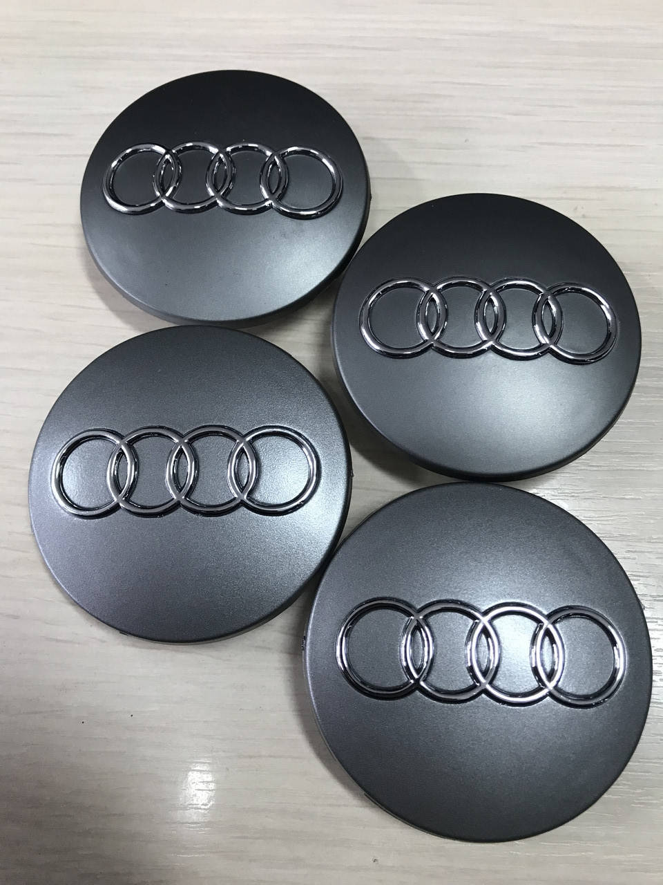 

Колпачки заглушки на диски Audi 68/56/12мм. 8D0 601 170 Серые