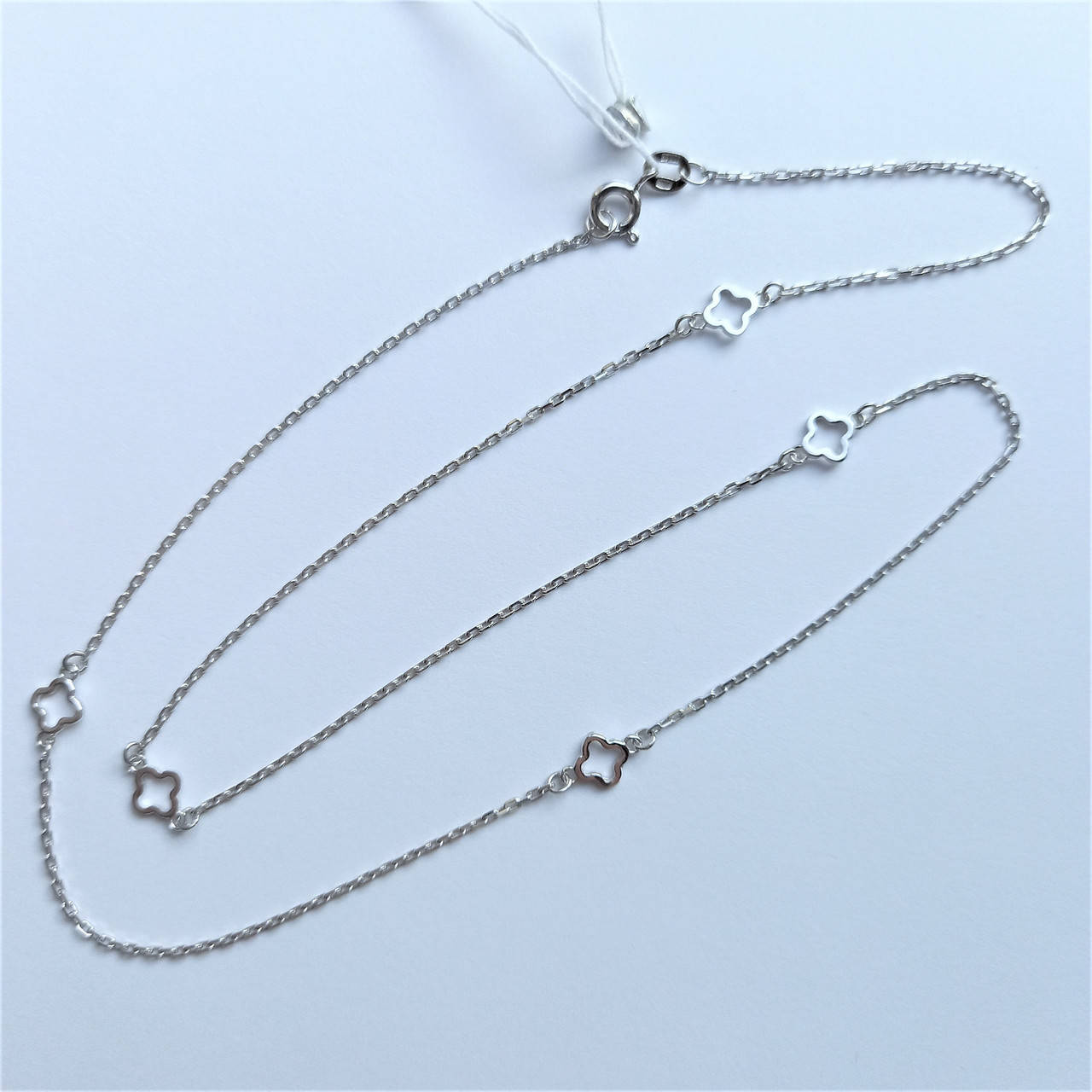 

Серебряное колье Клевер