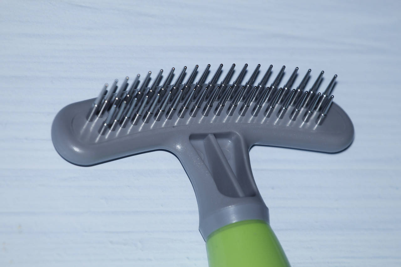 

Расческа с вращающимися зубьями для собак (с длинной шерстью)