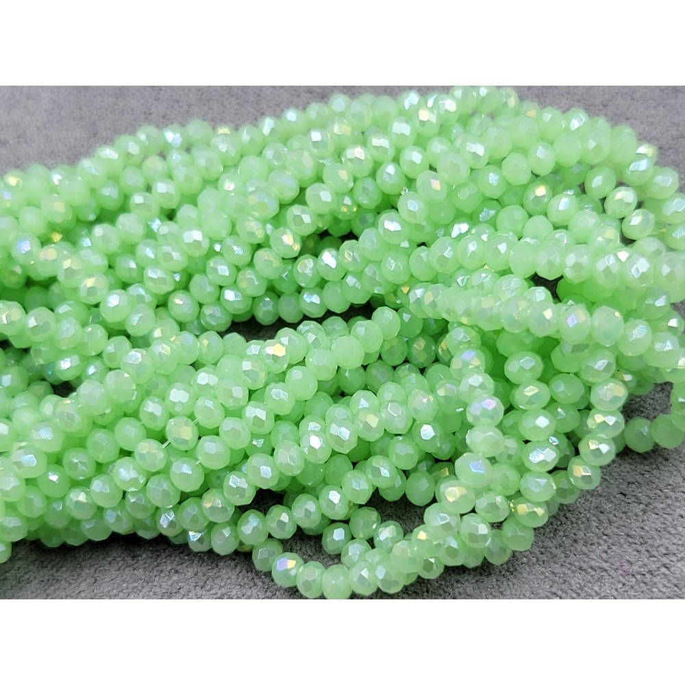 

(190шт) Хрустальные бусины(рондель). Размер 2 мм. В упаковке прим.190 шт. цвет - светло-зеленый матово