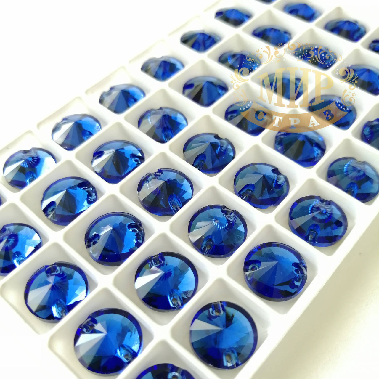 

Пришивные камни Lux 10мм, форма Риволи, цвет Sapphire, 1шт