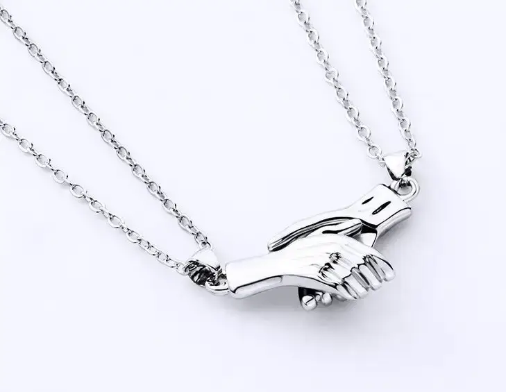 

Магнитные кулоны для пары Рука в руке Silver