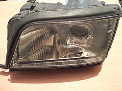 Фара передня ліва Hella Audi 100 A6 C4 91-97г