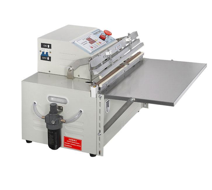 Вакуумна пакувальна машина з зовнішнім вакуумуванням. Зовнішня безкамерна. Наповнення газом.