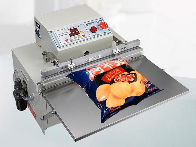 Вакуумная упаковочная машина