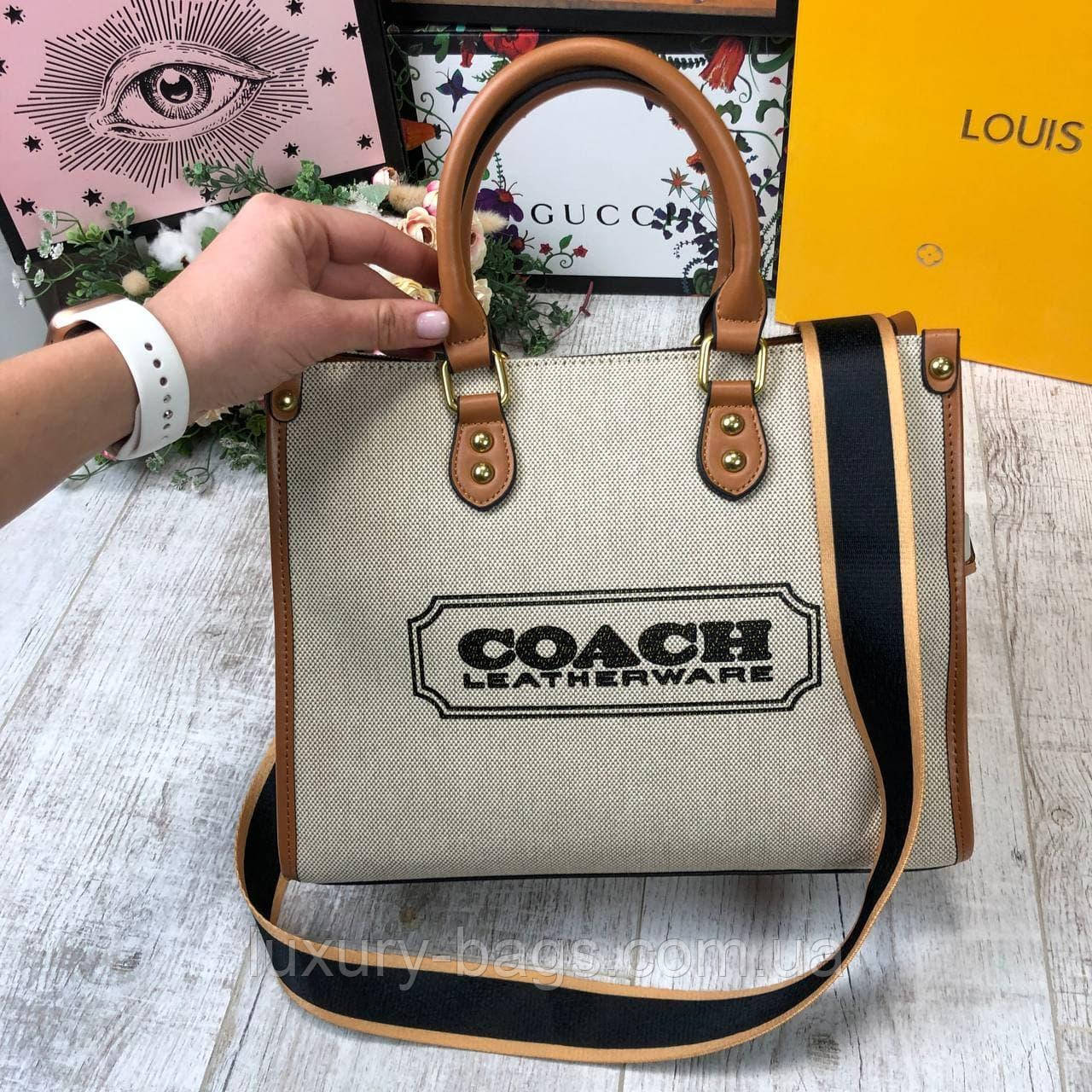 Жіноча крута тканинна сумка Coach бежева
