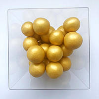 Рисовые воздушные шарики в молочном шоколаде золото 50г