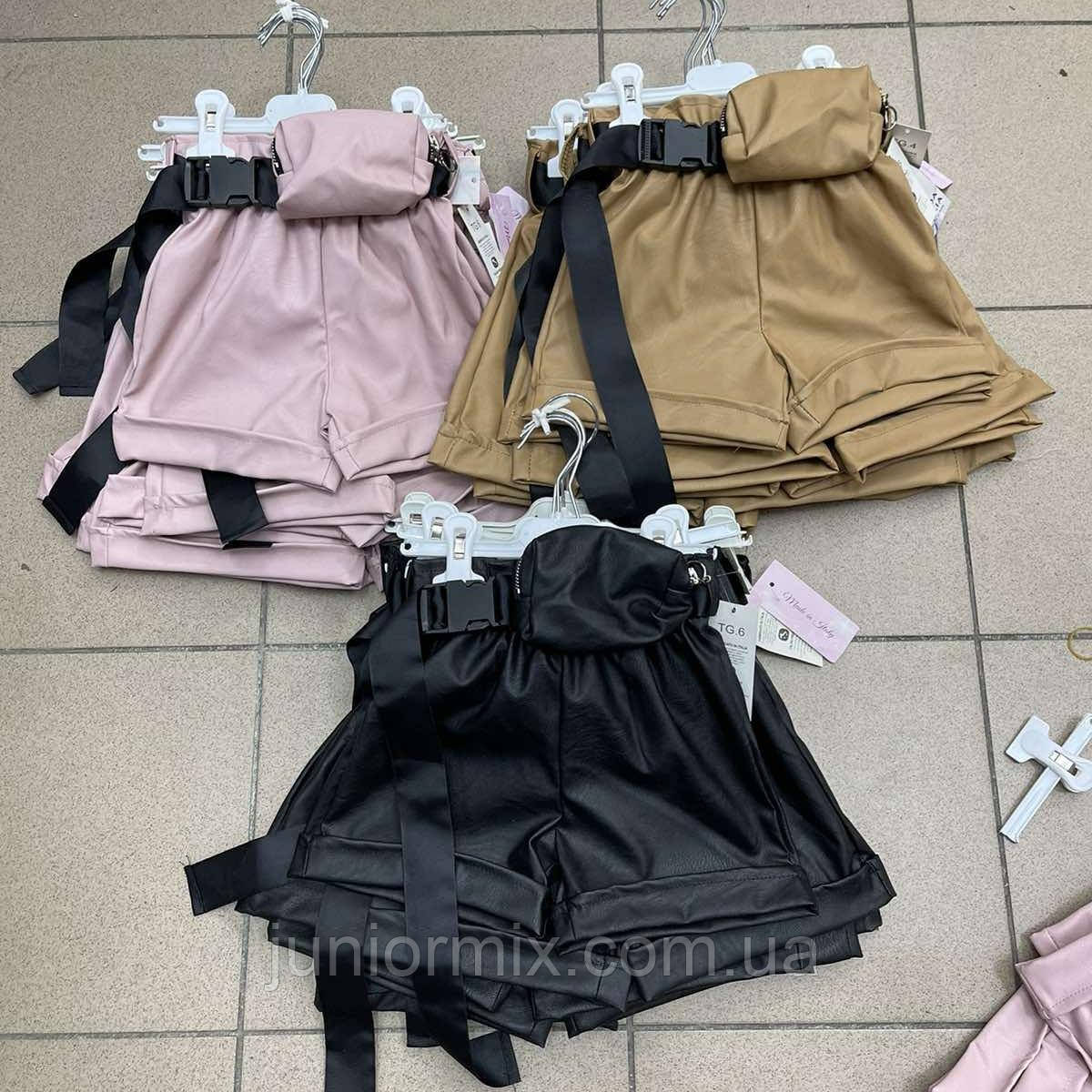 Дитячі шорти зі шкірозамінника із сумочкою для дівчаток оптом