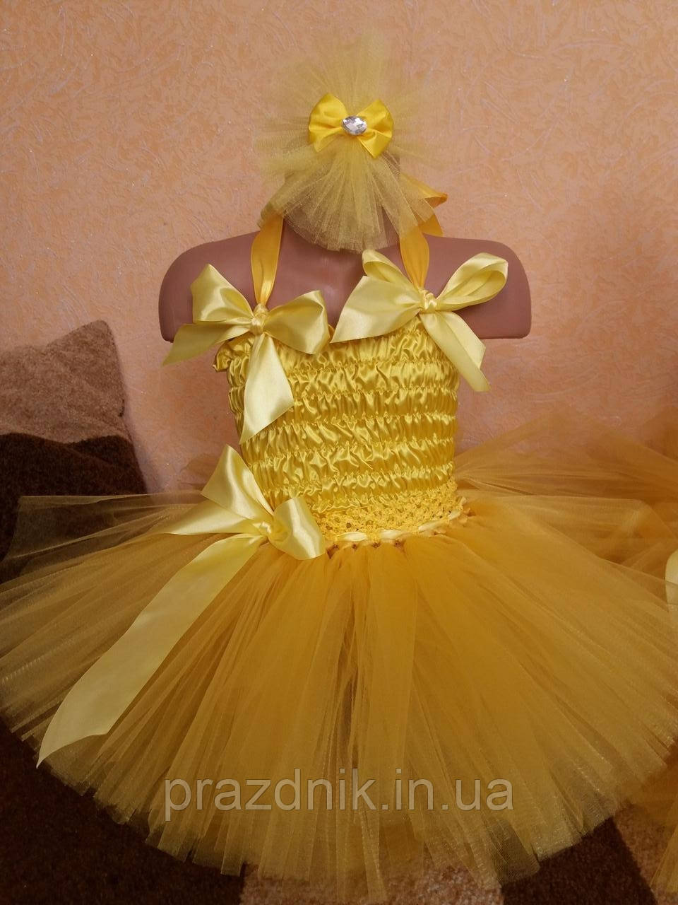 Жовтий костюм для дівчинки