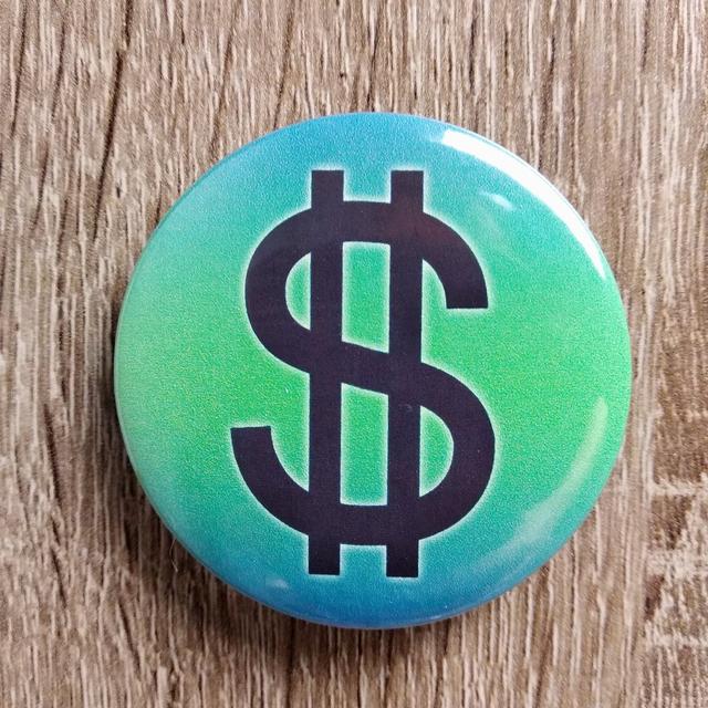 Значок із зображенням грошового знаку долара