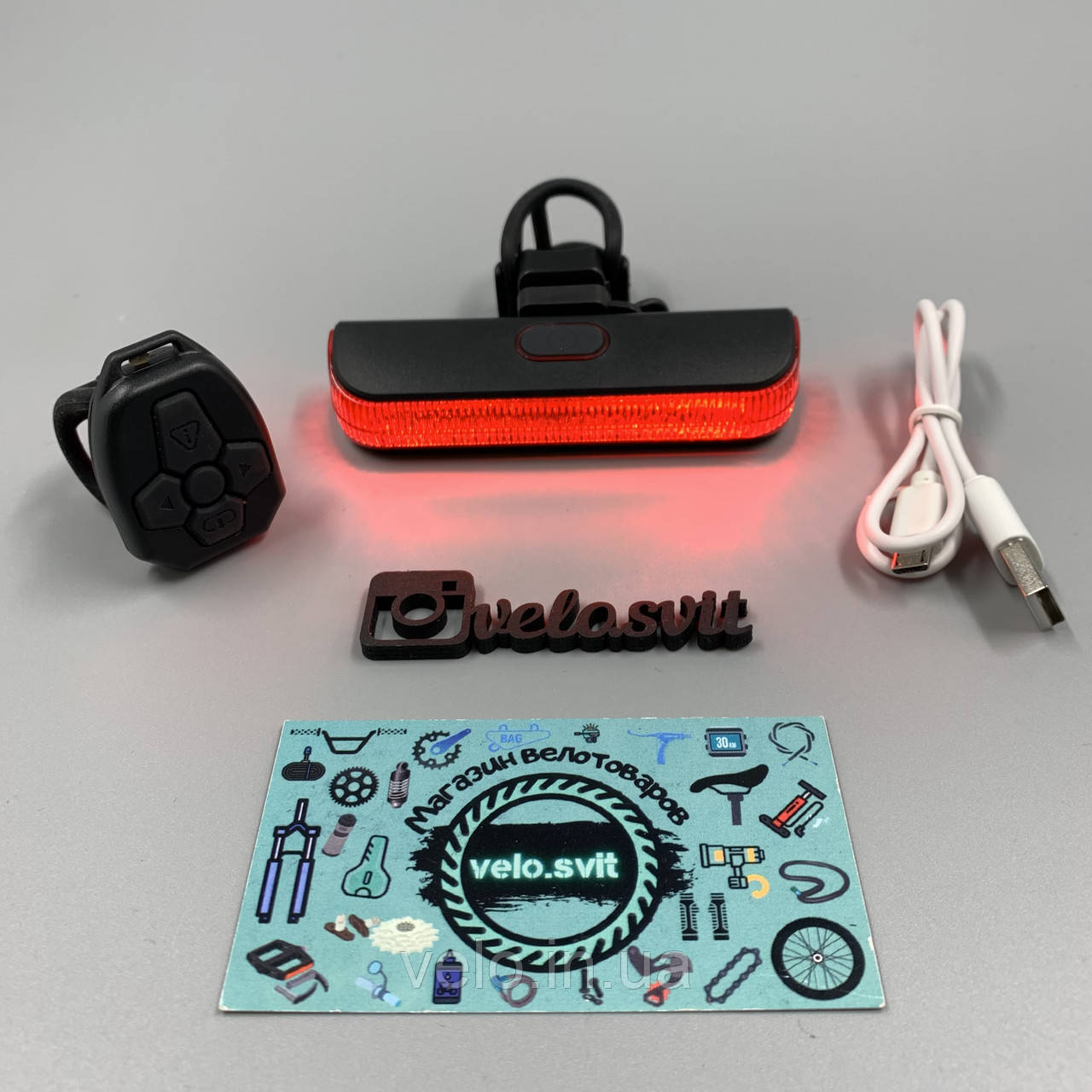 Задній ліхтар-мигалка USB з покажчиком поворотів з пульта