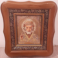 Икона Николая Чудотворца святителя, лик 15х18 см, в светлом деревянном киоте.