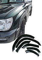 Розширювачі колісних арок LASSCAR на Toyota Land Cruiser 100 під силові бампери